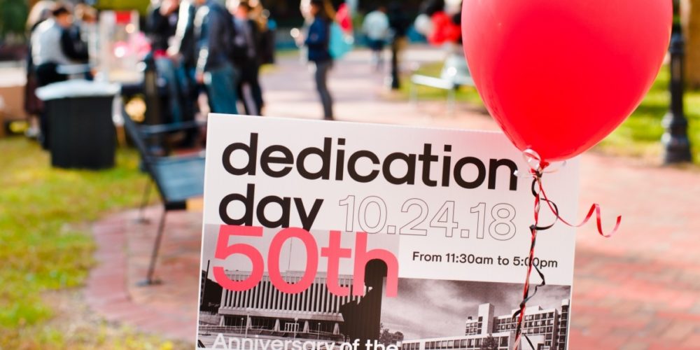 Dedication Day poster on the plaza.